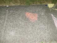 sidewalk chalk art of red heart