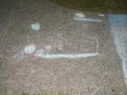sidewalk chalk art white two story house with blue grass yellow sun white moon
