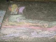 sidewalk chalk art yellow sunshine and rainbow waves