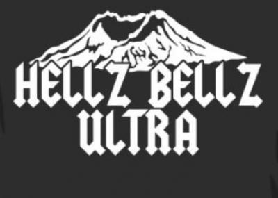 Hellz Bellz Ultra logo has white text on black background in front of Mt St Helens